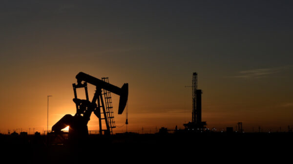 Oil extraction at sunset in an oil field in Midland, Texas. REUTERS/Nick Oxford. Climate leaders, oil bosses pitch alternate energy-transition realities